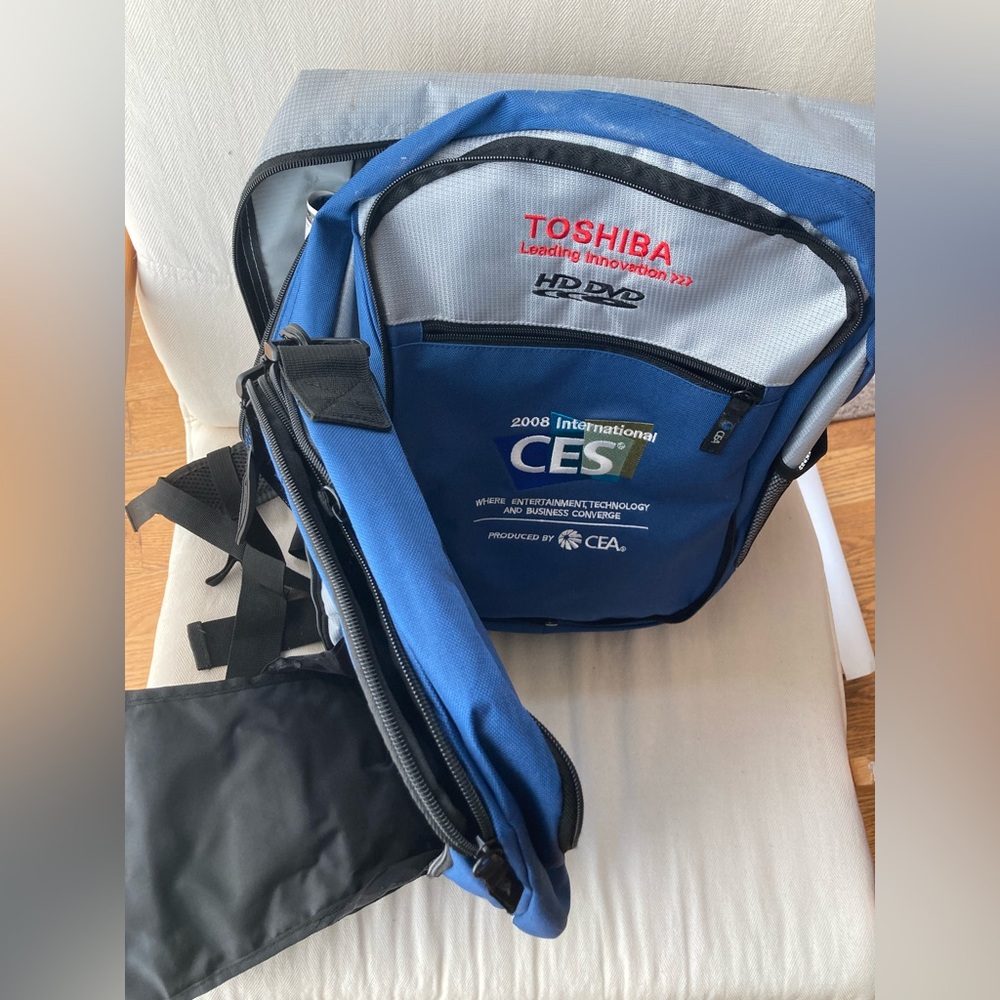 Blue and silver multi-compartment backpack with 22 pockets